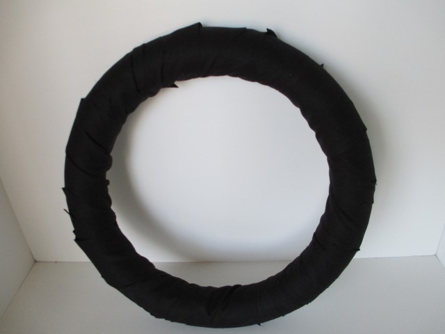 Wreath form covered in Balck fabric